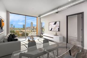 Grand Rapids apartment for rent - an open living room with a view of the city