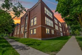 Madison apartment for rent - A red brick building with a walkway in front.