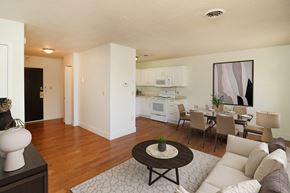 Grand Rapids apartment for rent - a living room and dining room with a couch and a table