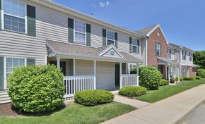Kalamazoo apartment for rent - an apartment building with a sidewalk in front of it