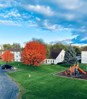 Wyoming apartment for rent - Sunflower Apartments Exterior Lawn & Playground