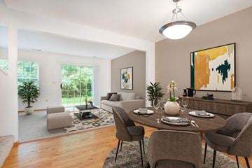 Kalamazoo apartment for rent - a living room and dining room with a table and chairs
