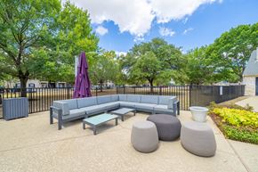 San Marcos apartment for rent - the reserve at bucklin hill leasing office patio with couches and tables
