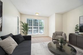 Greensboro apartment for rent - a living room with a couch and a coffee table