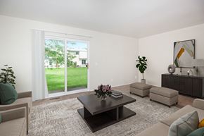 Monroe Township apartment for rent - a living room with a couch and a coffee table
