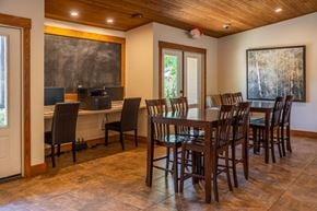 Flagstaff apartment for rent - A dining room with a wooden table and chairs.