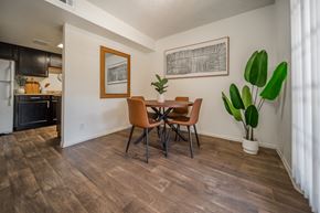 Flagstaff apartment for rent - A dining room with a wooden table and chairs.