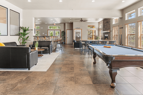 Flagstaff apartment for rent - A large room with a pool table and a billiard table.