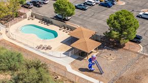 Cottonwood apartment for rent - A playground with a slide and a tree.