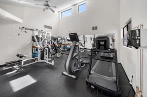 Tucson apartment for rent - A well equipped gym with a treadmill, weights and exercise machines.