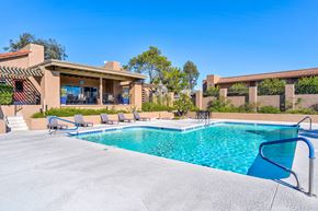 Tucson apartment for rent - A pool with lounging chairs.