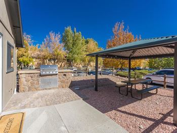 Gathering area with grills and corn hole