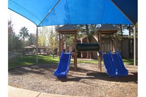 Sierra Vista apartment for rent - a playground with two slides and a monkey bars