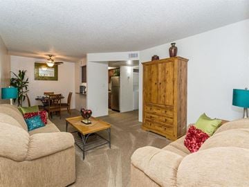 Flagstaff apartment for rent - a living room with a couch and a table