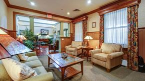 Walkersville apartment for rent - A living room with a sofa, armchair, and coffee table.