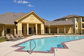 San Antonio apartment for rent - Resort style swimming pool with sundeck at Port Royal Apartments Homes, San Antonio, TX