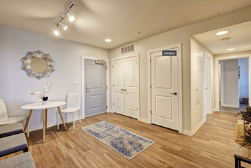 New Britain apartment for rent - a living room with white doors and a table