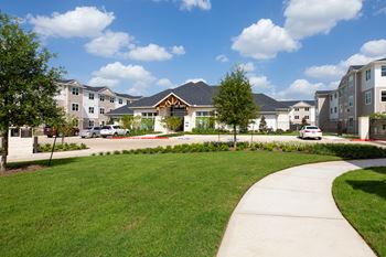 A residential area with houses and a clear sky