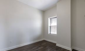 Hartford apartment for rent - A room with a window and wooden flooring.
