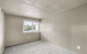 Washington apartment for rent - Carpeted bedroom with window and blinds  at The Village at Chesapeake Apartments, District of Columbia