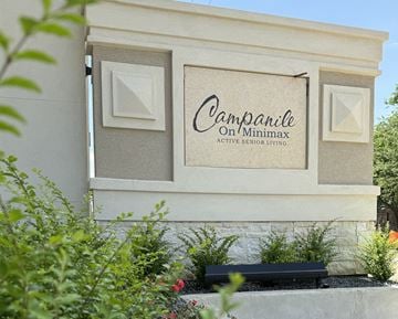 Houston apartment for rent - A sign for Campanile on Minimax Active Senior Living is displayed on a building.