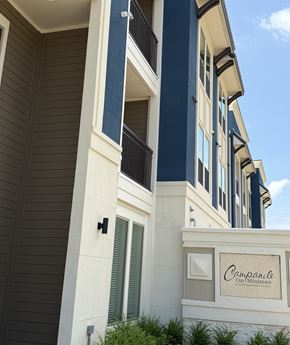 Houston apartment for rent - A building with a sign that says "Campanile" on it.