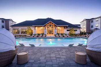 Pool, community building rear exterior view