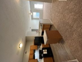 San Antonio apartment for rent - Open concept kitchen with island and wood cabinets at Palo Alto Apartments Homes, San Antonio, Texas
