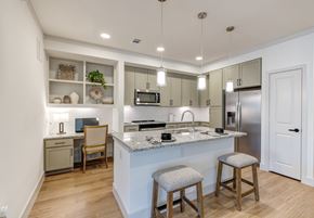Katy apartment for rent - A kitchen with a white counter top and a sink.