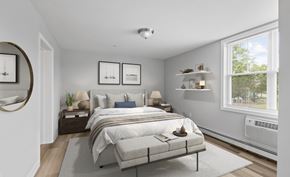 Tyngsborough apartment for rent - A bedroom with a large bed and a window.