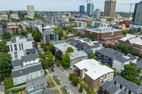 Seattle apartment for rent - A cityscape with buildings of various sizes and a clear sky.