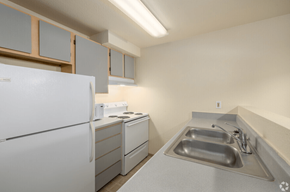 Seattle apartment for rent - 2-bedroom kitchen with oven, stove, refrigerator and microwave