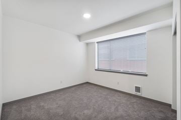 Lacey apartment for rent - the living room of an apartment with a window and carpet