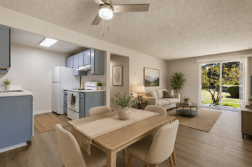 Everett apartment for rent - A modern kitchen with a dining table and chairs.