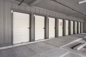 Olympia apartment for rent - A long row of garage doors are closed.