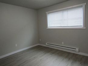 Lakewood apartment for rent - A room with a window and a radiator on the floor.