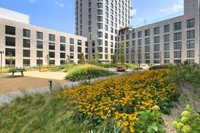 Brooklyn apartment for rent - a park with yellow flowers in front of a tall building