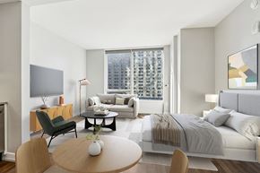 Philadelphia apartment for rent - A modern bedroom with a large bed and a television.