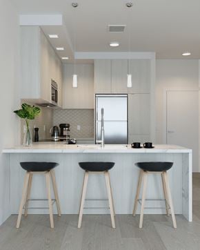 North Bethesda apartment for rent - Kitchen with Light Finishes featuring Island at Arrowwood Apartments, Maryland