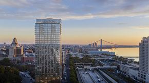 Philadelphia apartment for rent - Sunset photo with rendered version of The Ryland against Philadelphia skyline