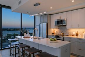 Philadelphia apartment for rent - a kitchen with a large island with a sink and a window