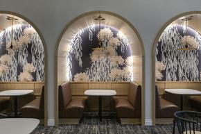 North Bethesda apartment for rent - A dining area with a wallpapered backdrop and a table in the middle.