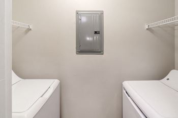 A washer and dryer in a laundry room
