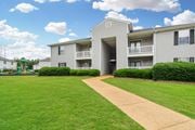 Columbus apartment for rent - A large apartment complex with a playground in the front.