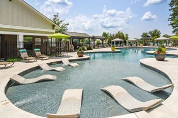 Relaxing swimming pool with sundeck