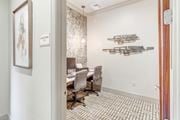 Oxford apartment for rent - a dining room with a table and chairs and a wall with weapons on the wall at Cambridge Station Apartment Homes, Oxford, 38655