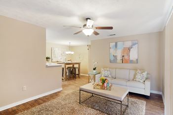 A living room with a couch and a coffee table