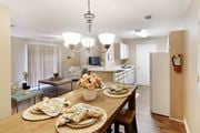Mccomb apartment for rent - a kitchen and dining room with a table and chairs at Parklane Apartment Homes, McComb, 39648