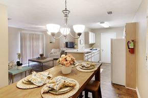 Mccomb apartment for rent - a kitchen and dining room with a table and chairs at Parklane Apartment Homes, McComb, 39648