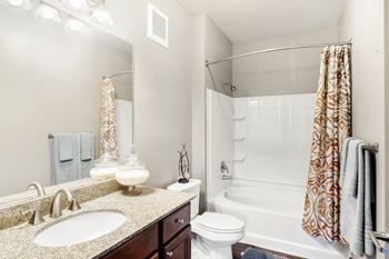 Designer granite countertops in all bathrooms